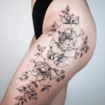 Rose front thigh tattoo for women