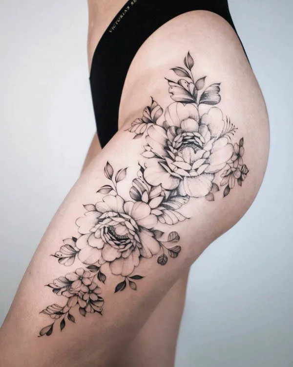 Rose front thigh tattoo for women