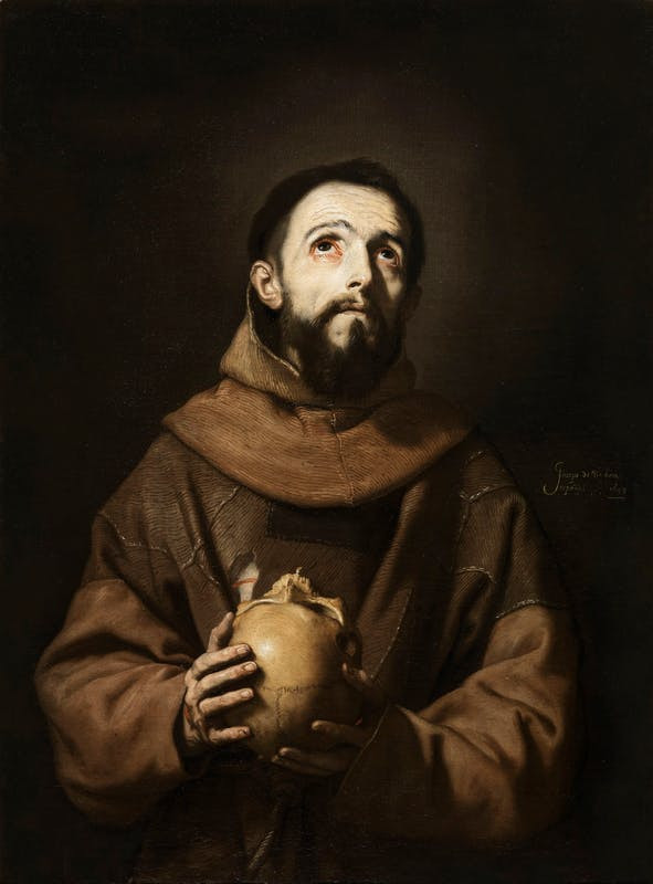 Saint Francis meditating with a skull, symbolizing reflection on mortality and faith