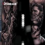 Tattoo artist using thinned ink