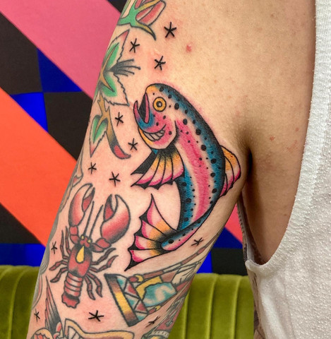 Celestial-themed gap filler tattoo