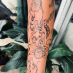 Floral gap filler tattoo