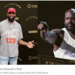Shaquille O'Neal with tattoos visible, showcasing his personal expression through body art