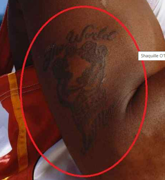 Shaquille O'Neal's tattoo &quot;The World Is Mine&quot; as a symbol of his ambition and achievements