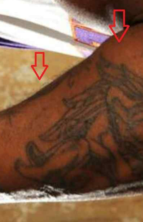 Shaquille O'Neal's angel tattoo symbolizing guidance, strength, and spiritual beliefs