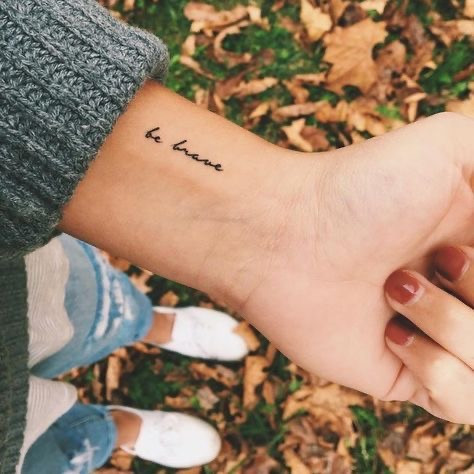 Small sun and moon tattoo