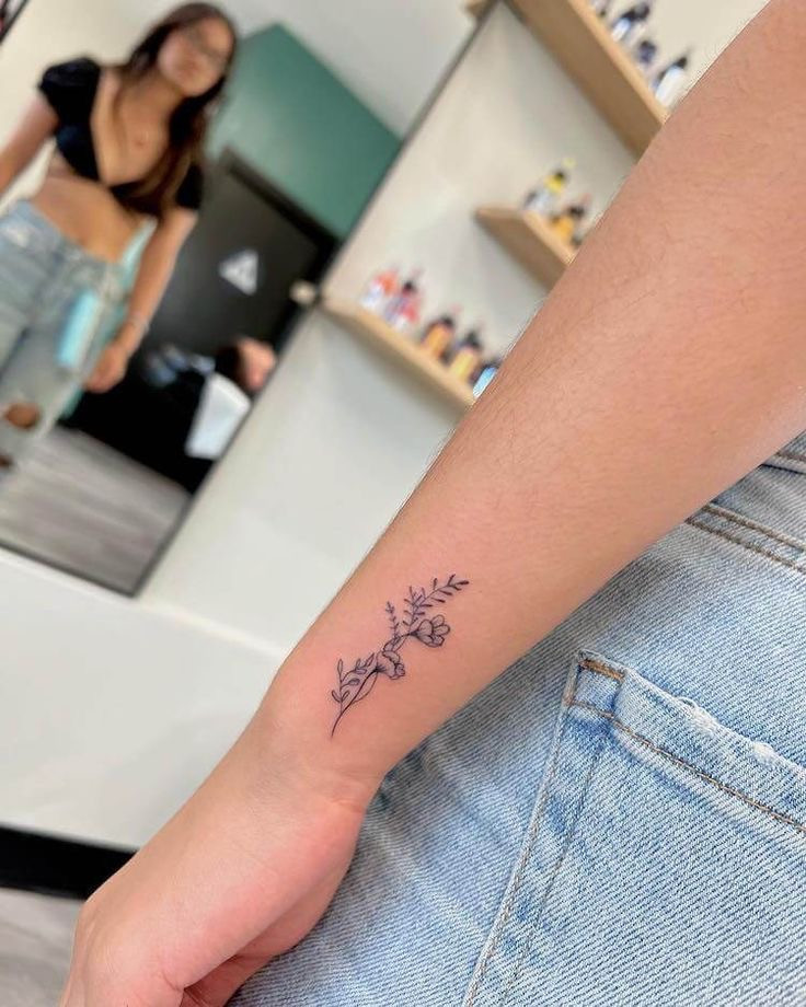 Small botanical tattoo