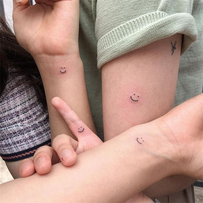 Minimalist Smiley Face Tattoo
