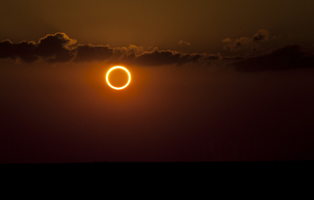 Solar eclipse tattoo showcasing the fusion of art and celestial symbolism