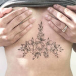 Floral Sternum Tattoo