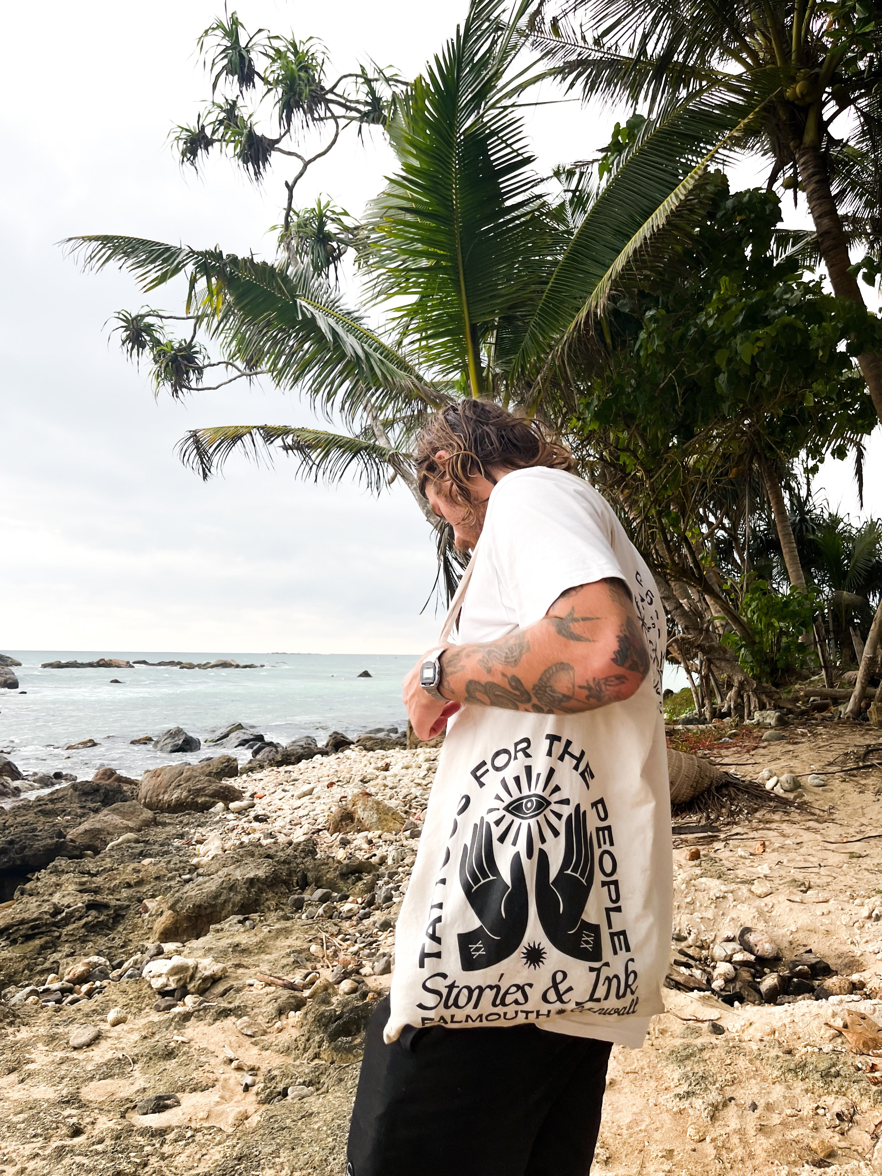 Travel essentials for new tattoo aftercare including antibacterial soap, fragrance-free moisturizer, and sunscreen