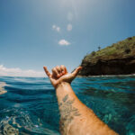 Surfer arm tattoo