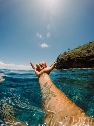 Surfer arm tattoo
