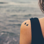 Woman with floral tattoo