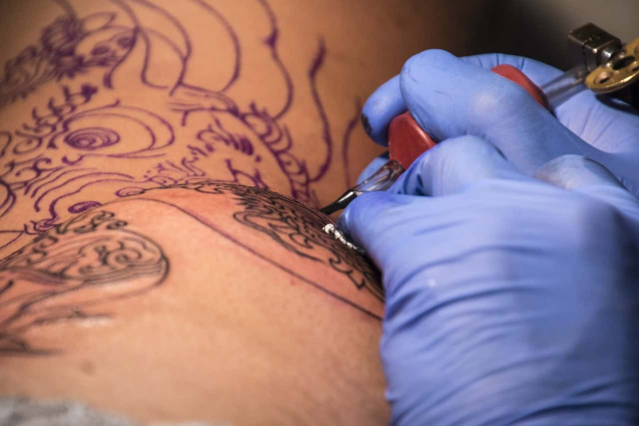 Tattoo artist at work