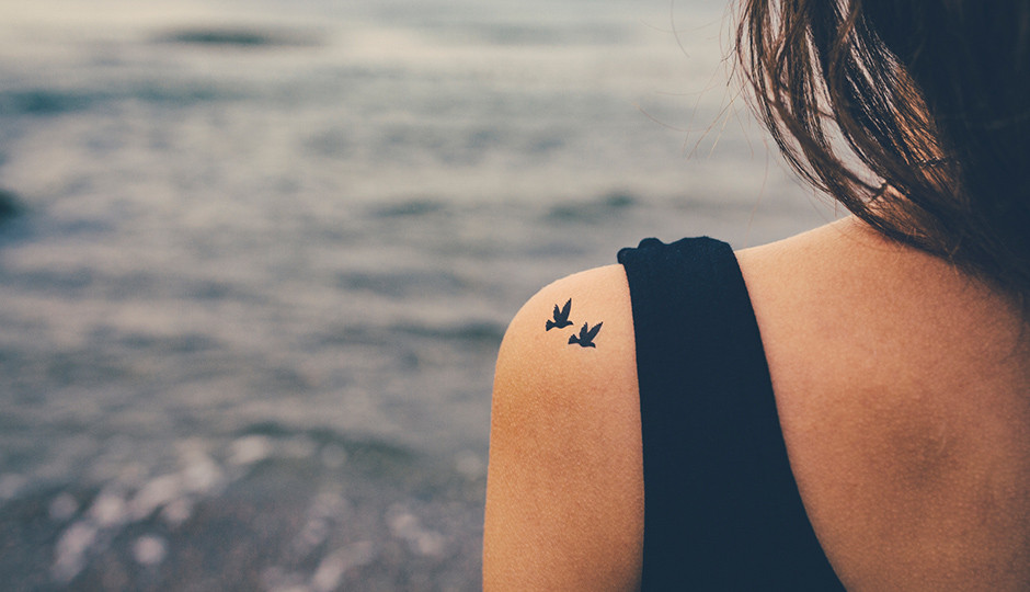 Woman with floral tattoo