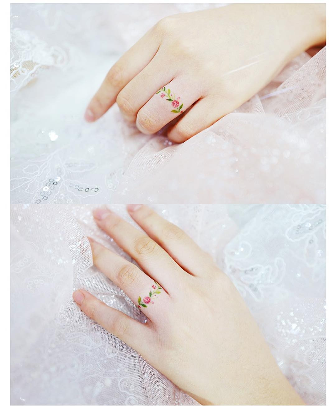 A floral ring tattoo on a woman's finger, showcasing a dainty and colorful design that resembles jewelry.