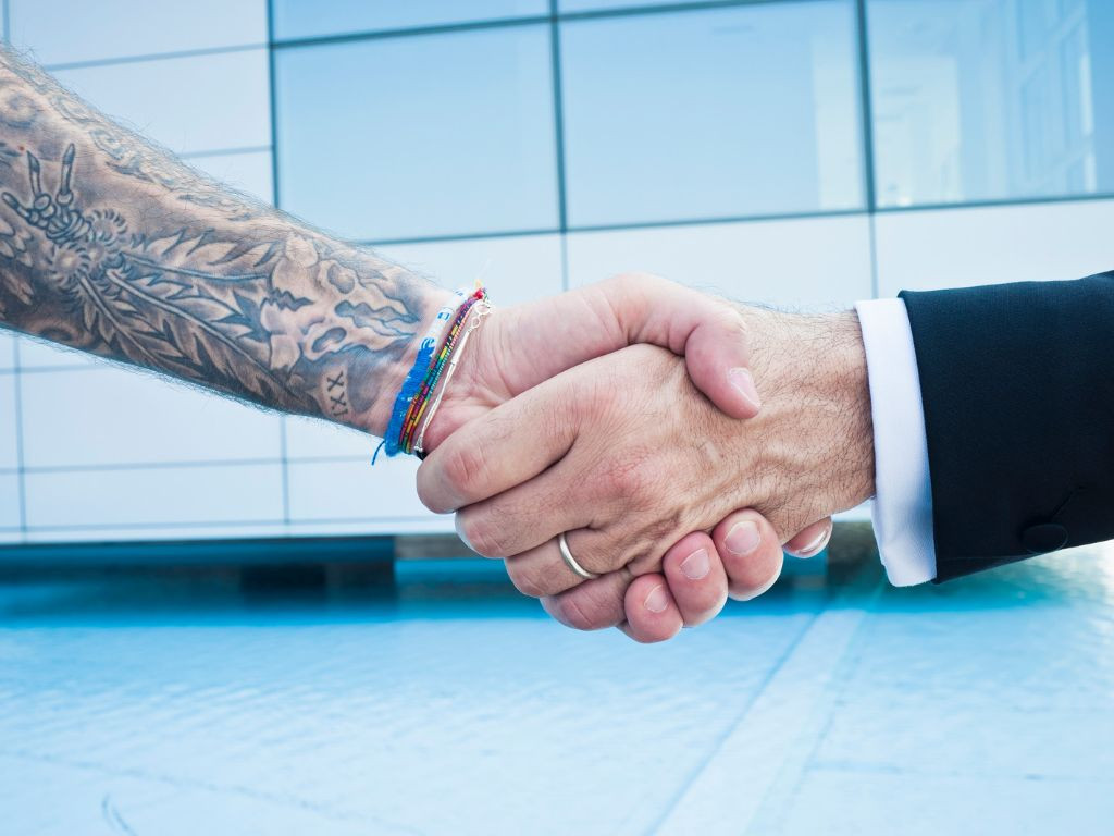Teacher with Tattoo handshake