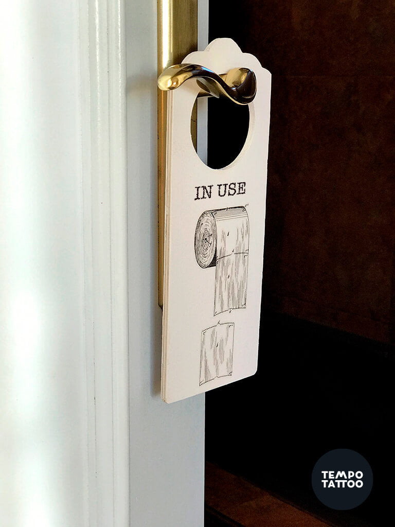 Various wooden objects with decorative temporary tattoos