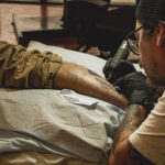 Tattoo artist at work