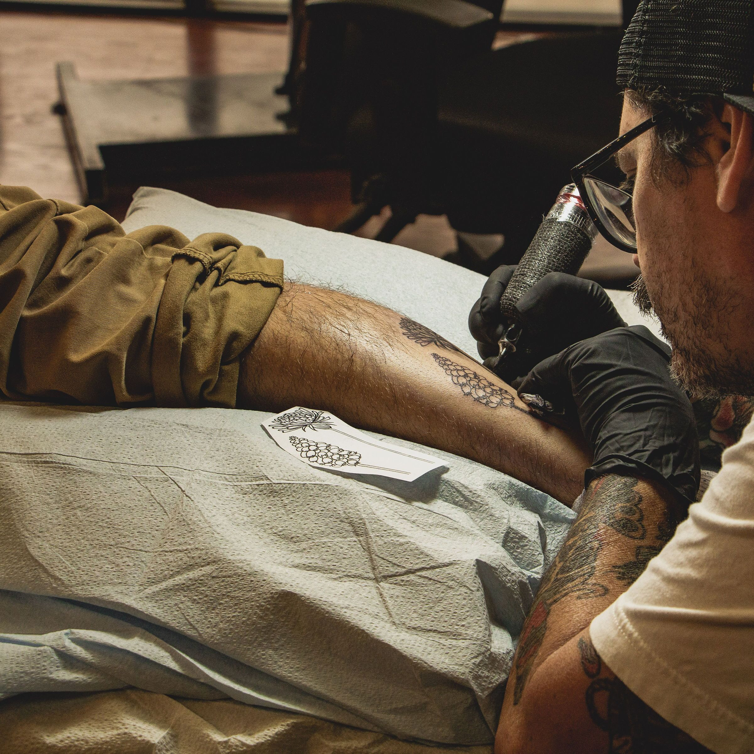 Tattoo artist at work