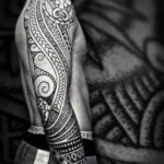 Neo-tribal tattoo on a man's arm