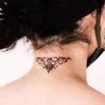 Vintage ornamental neck tattoo by @auua.tattoo