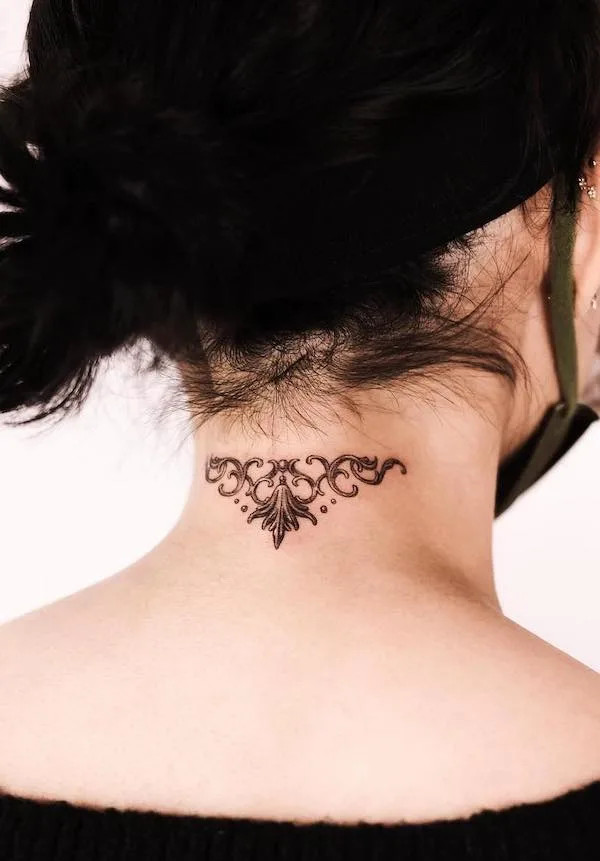 Vintage ornamental neck tattoo by @auua.tattoo
