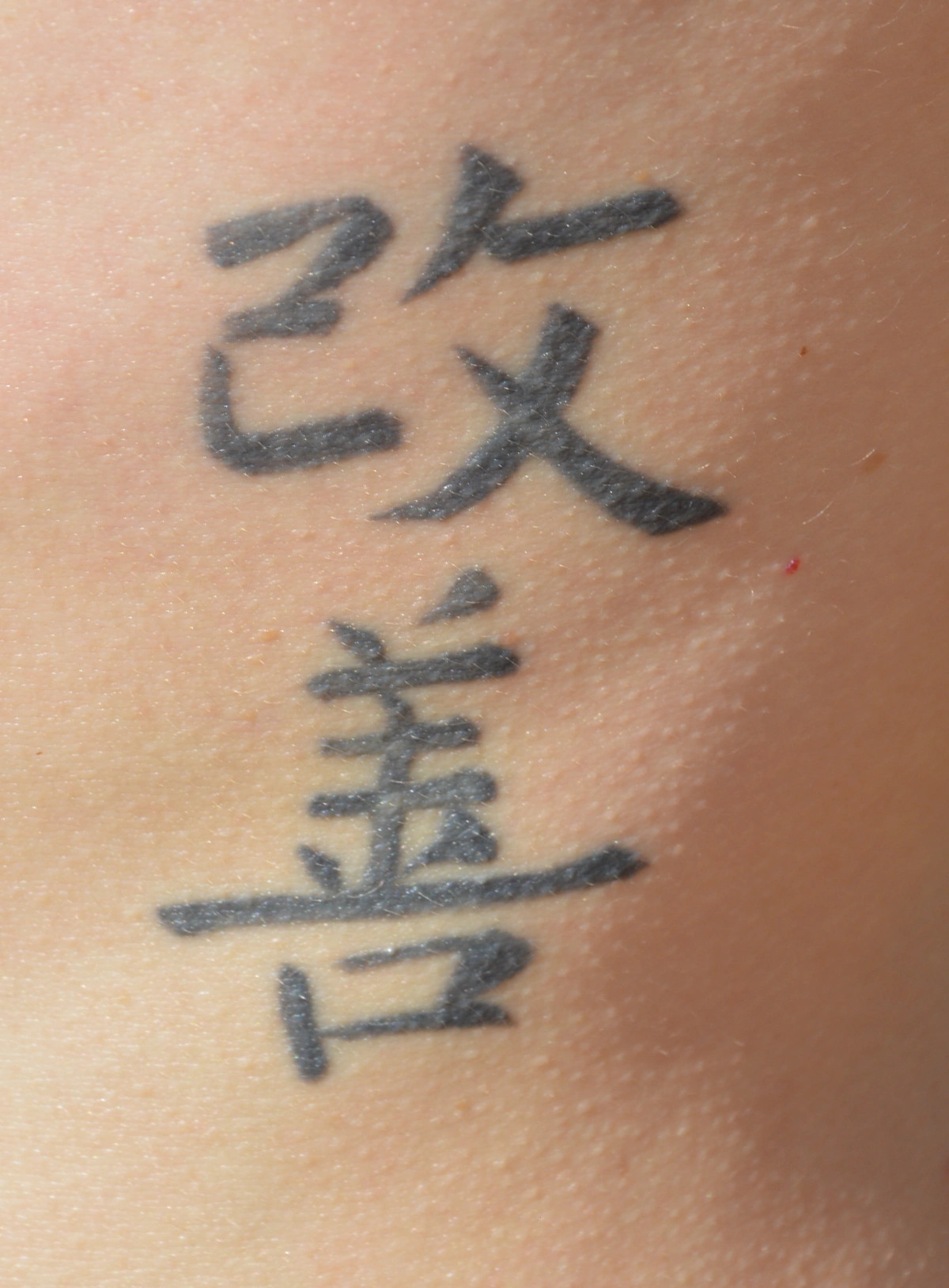 Lettering blackwork tattoo in Krakow, Poland