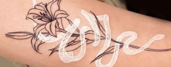 White ink tattoo with regular touch-ups