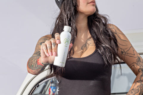 Proper aftercare steps for forearm tattoos, emphasizing cleanliness and hydration