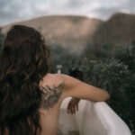 Woman with floral tattoo on arm