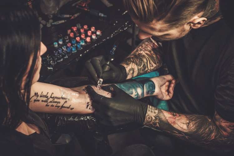 Receiving a quote tattoo