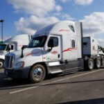 Truck driver showing arm tattoos