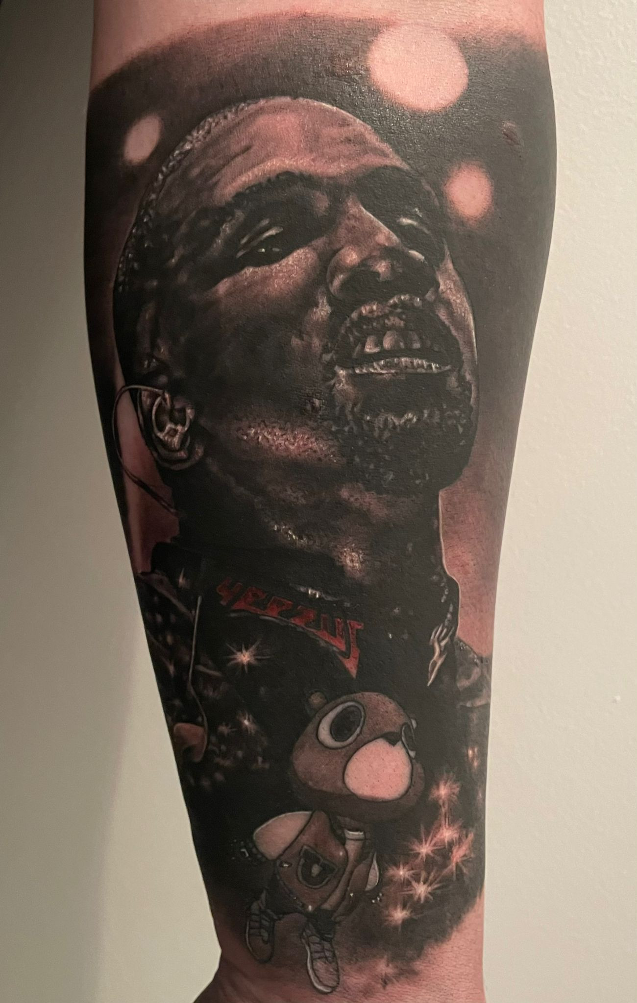 Leg tattoo of Kanye West