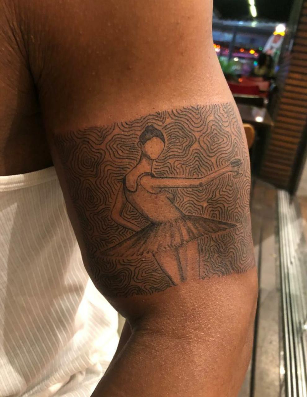 Arm showing My Beautiful Dark Twisted Fantasy ballerina tattoo art