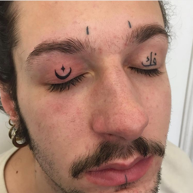 An example of a detailed and artistic eyelid tattoo, showcasing creativity and skill