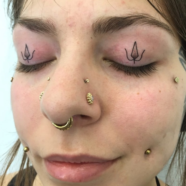 A close-up showcasing a perfectly executed winged eyeliner tattoo, highlighting precision and symmetry