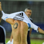 Messi with a portrait of his mother, Celia Maria Cuccittini on his left shoulder blade in 2011