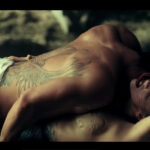 Taylor Kinney showed off his tattoos in the music video with Lady Gaga