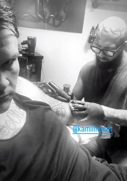 Travis Bacon's pig tattoo cover-up, showcasing his unique and bold artistic expression.