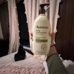 Aveeno lotion for tattoo aftercare, showcasing its gentle and hydrating properties