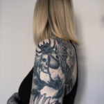 Upper arm tattoos