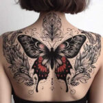 ButterflyTattoo with bold gothic details and intricate floral elements