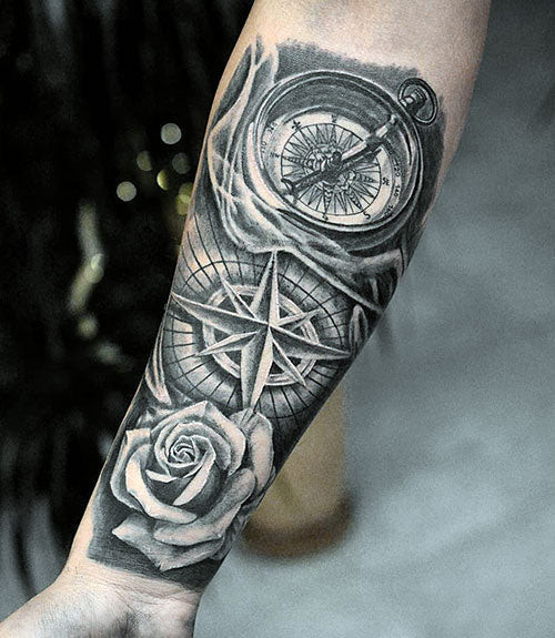 Detailed Rose and Compass Forearm Tattoo