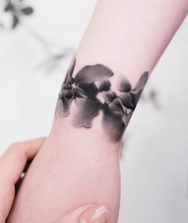 Flow of ink bracelet tattoo design by @liang.ink_
