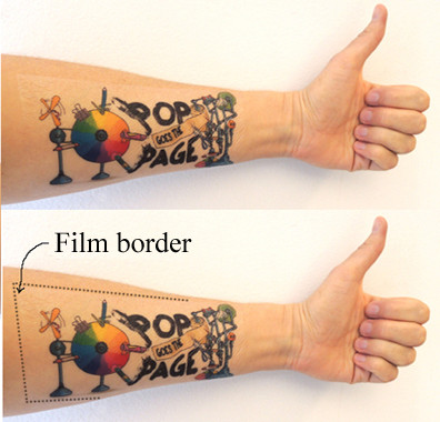 Forearm tattoo with dotted lines highlighting the film border