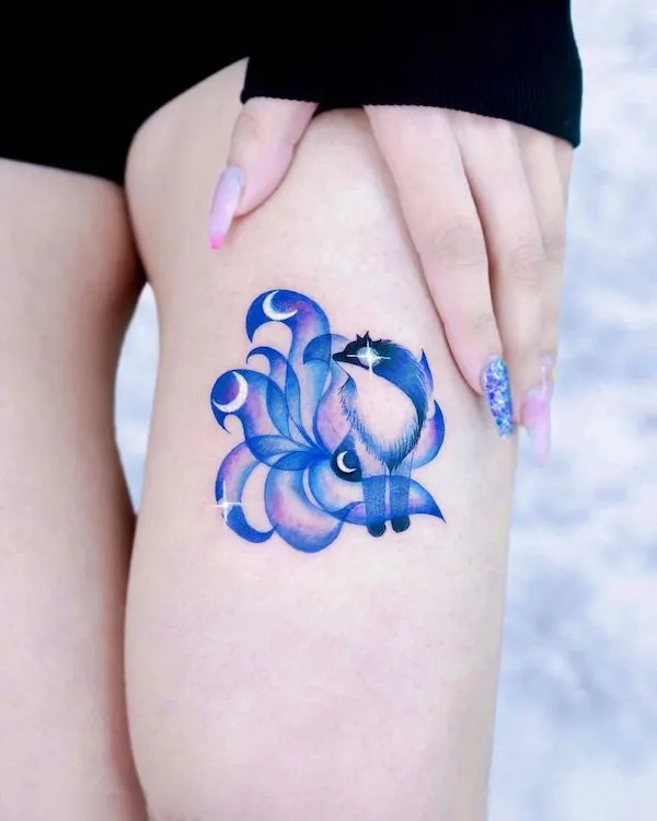 Fox spirit tattoo on the thigh, by @hwyl.tattoo, symbolizing intelligence and transformation