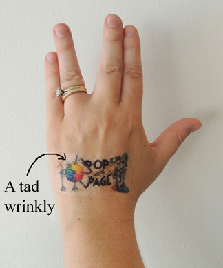 Hand tattoo showing potential wrinkling of the film