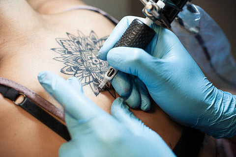 Tattooed symbol on the back